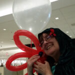 Dawn and Zach balloon dragonfly at Loscon 46 2
