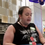 Liz reading at Loscon 46